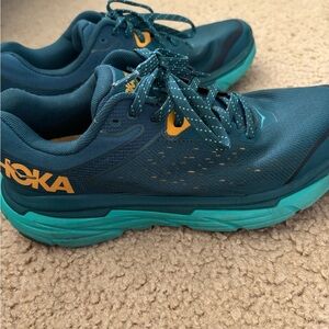 Hoka Blue and Yellow running shoes